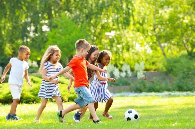 Kids playing on healthy grass