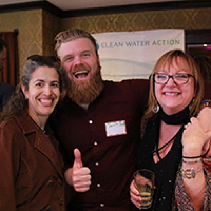 Kristine Acevedo (left) and Clean Water Action Advisory Board Member Jeremy Shenk (middle) smile with NE Director Cindy Luppi. 