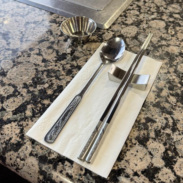 Reusable stainless steel sauce cup, chopsticks, and spoon