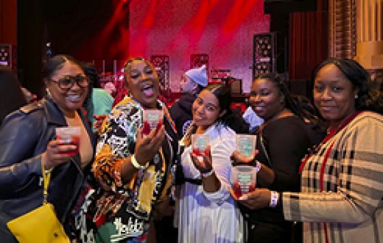 Concertgoers saying “cheers!” to ReThink Disposable at The Warfield.