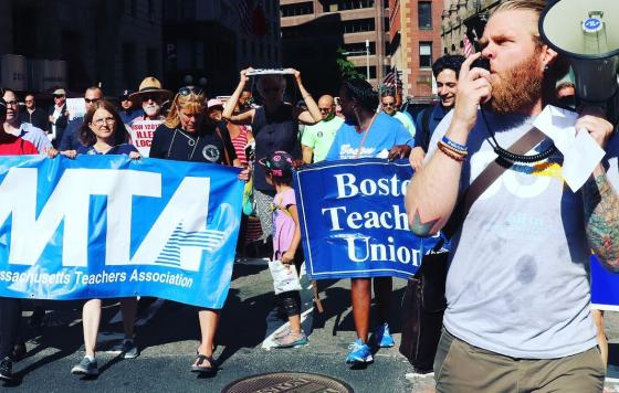 Jeremy Shenk (with megaphone) at a march