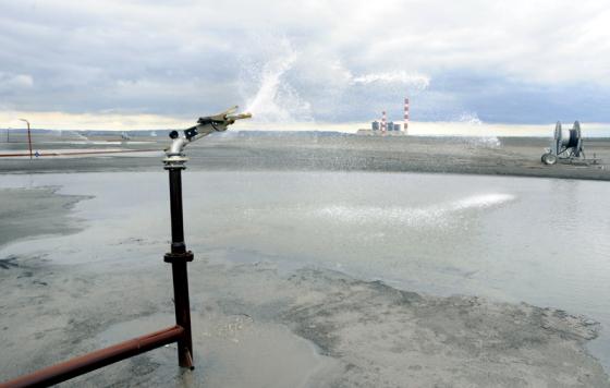 Sprinkler at a coal ash disposal site. Photo credit: bibiphoto / Shutterstock